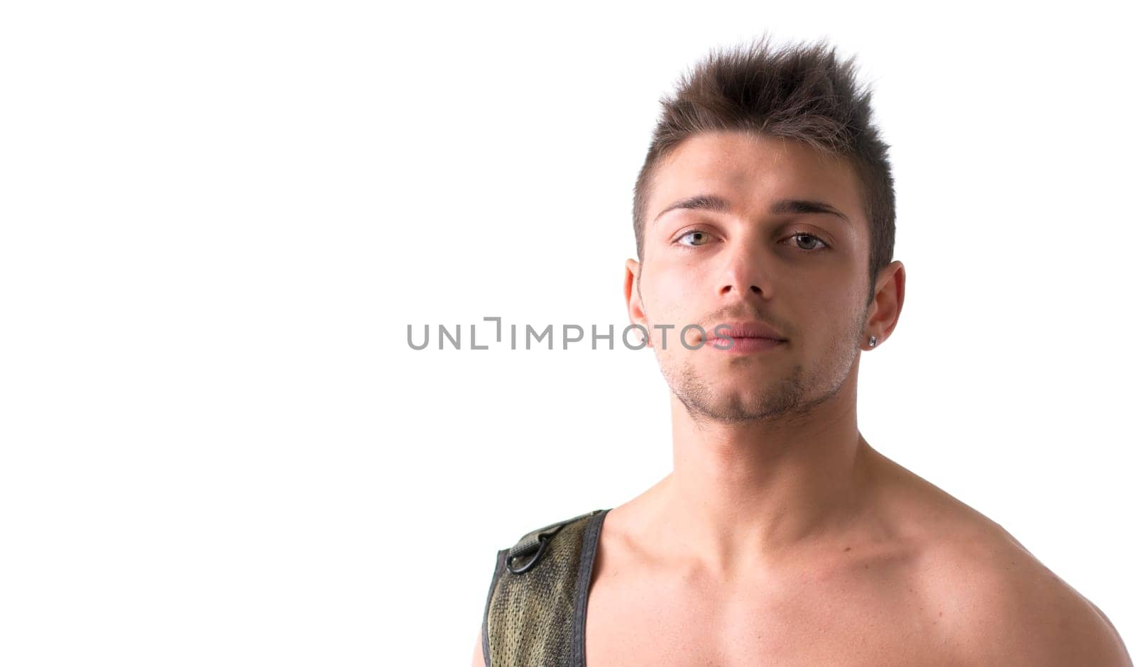 Headshot of shirtless young man with military vest on one shoulder, isolated on white