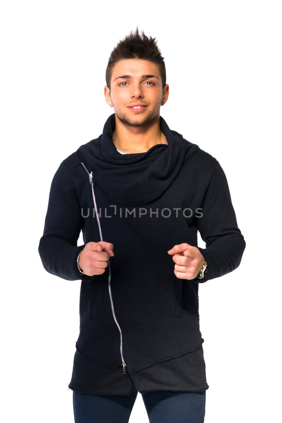 Attractive confident young man smiling, pointing fingers to you, to camera. Isolated on white
