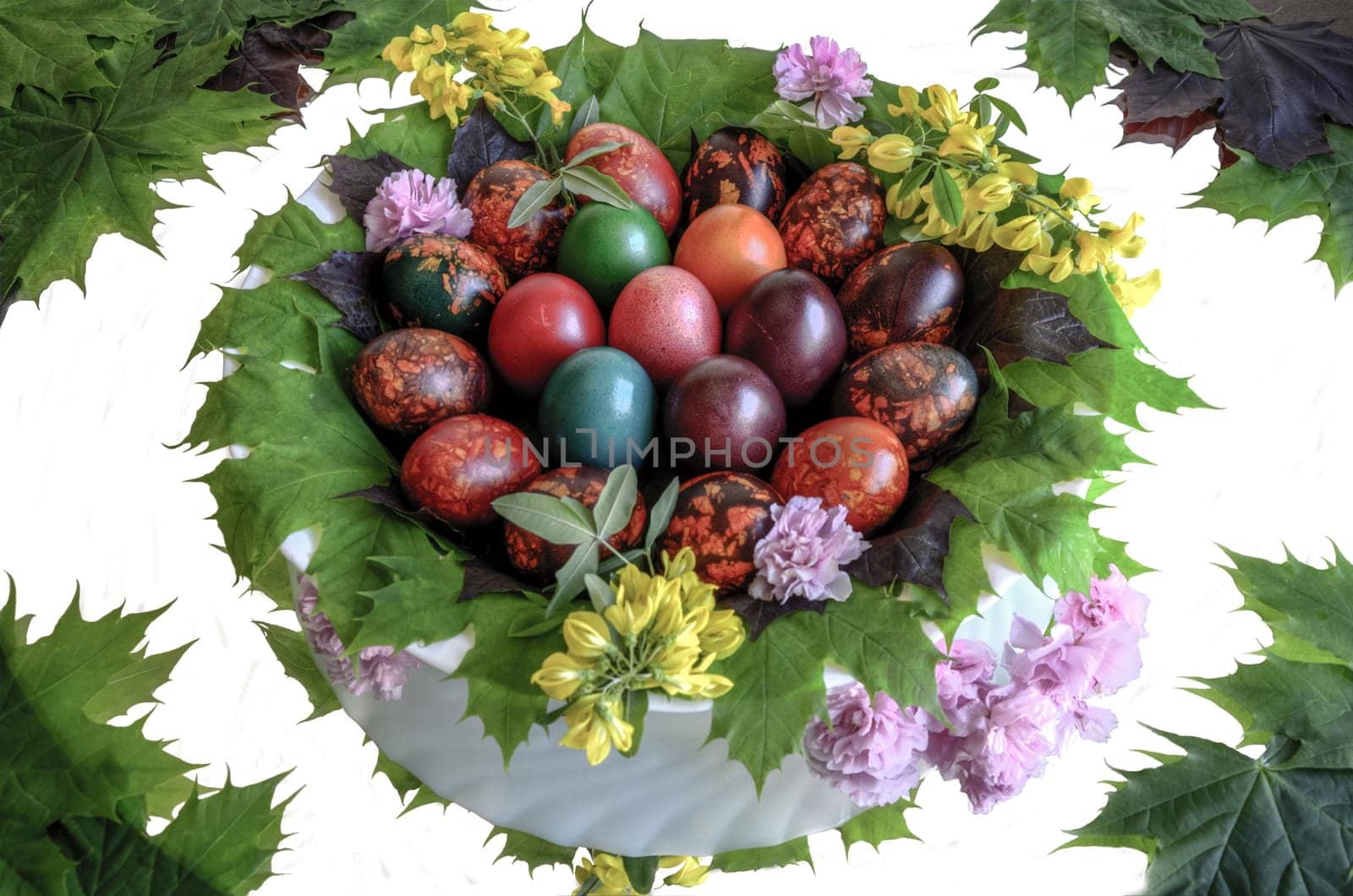 Very beautiful and colorful eggs inside a plate with mirror floor.