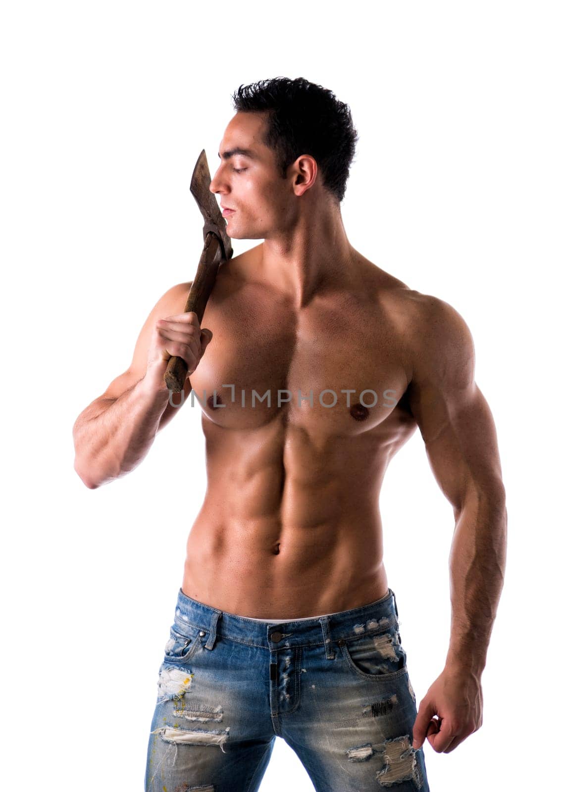 Male muscular shirtless bodybuilder holding lumberjack axe on shoulder isolated on white