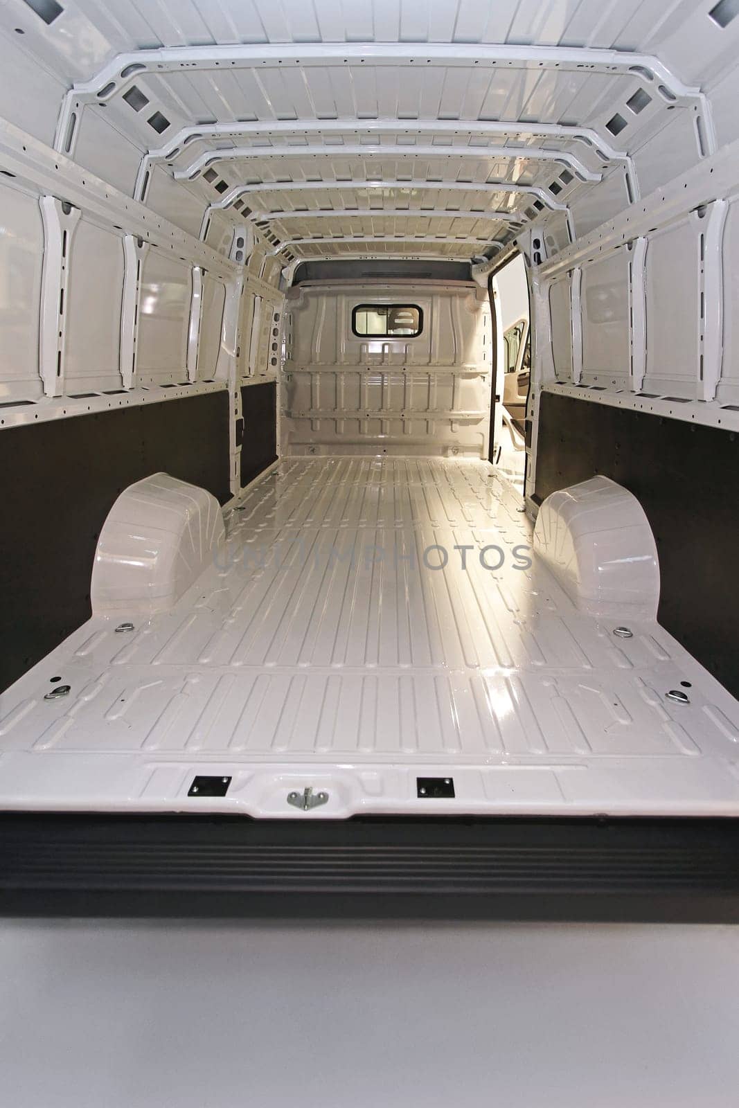 Empty long white delivery van transport