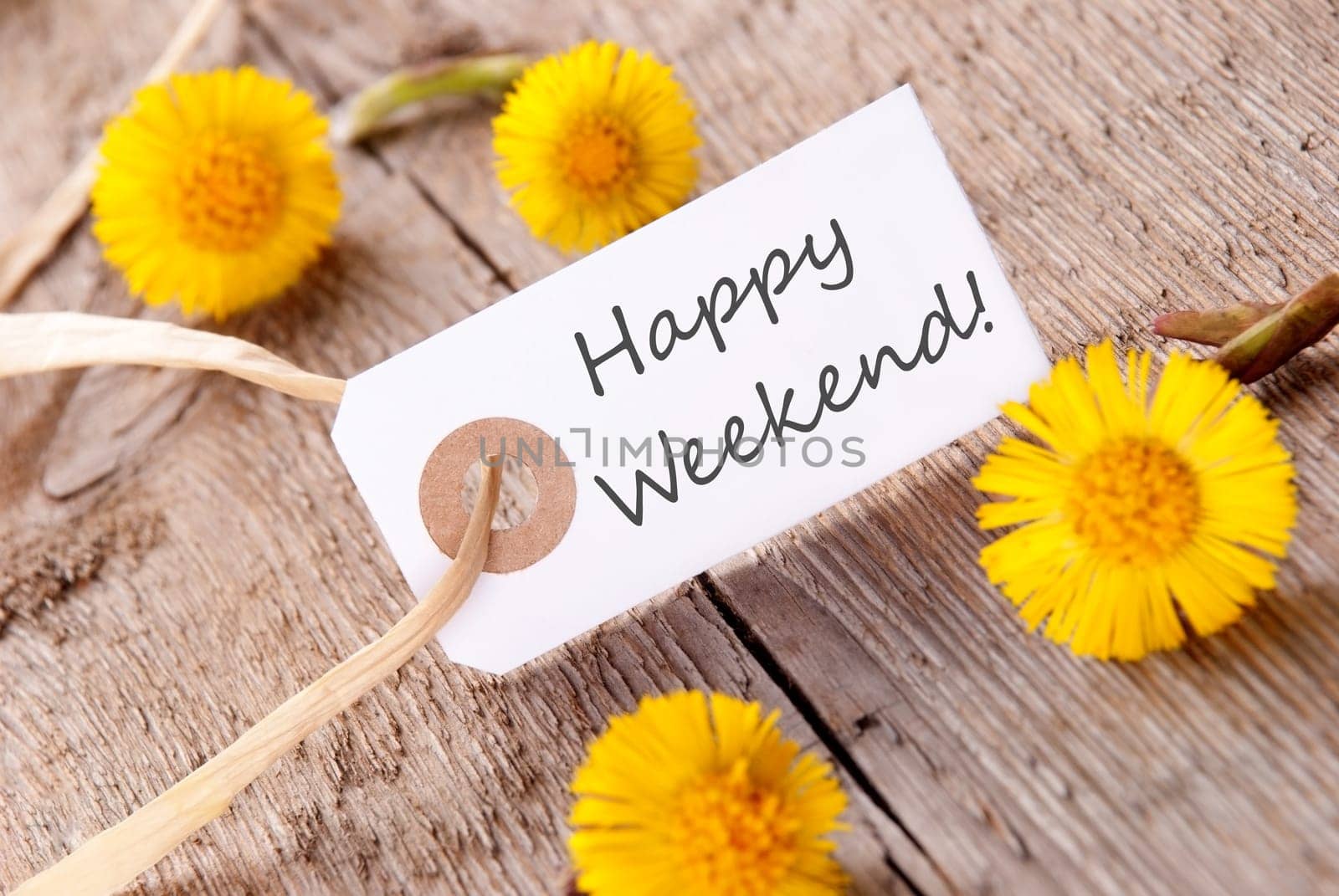 White Banner with the Words Happy Weekend on it and many yellow Flowers