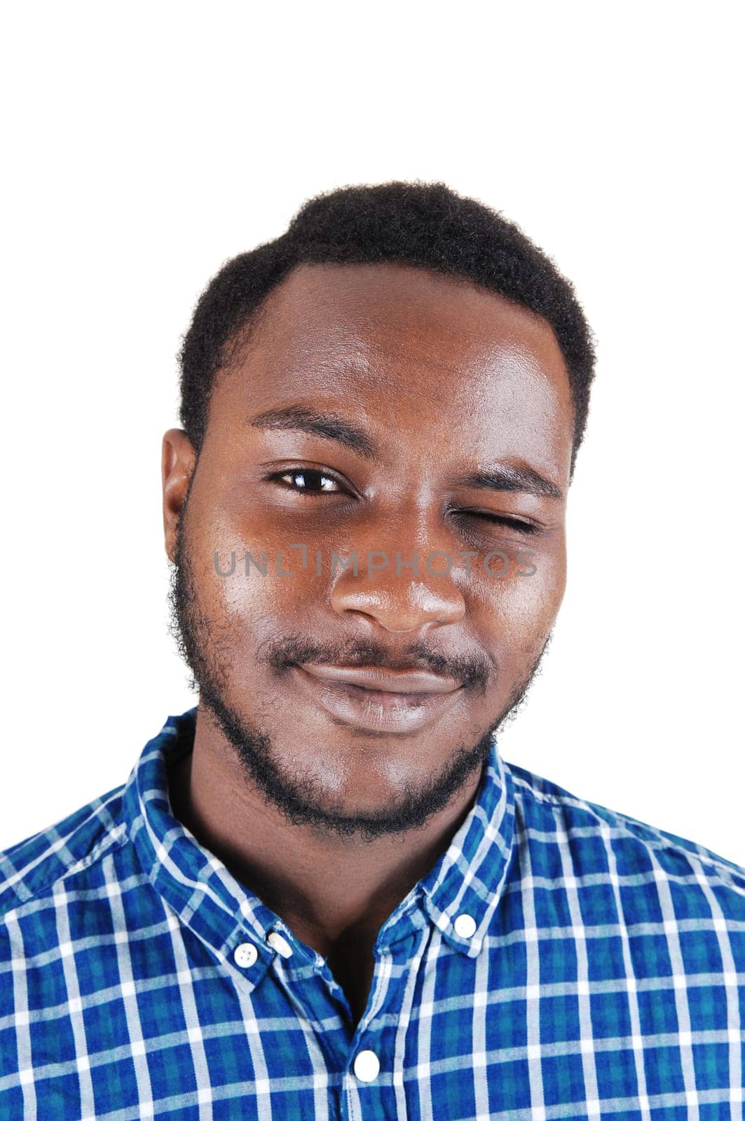A portrait picture of a young black man blinking with one eye closed,.isolated on white background..