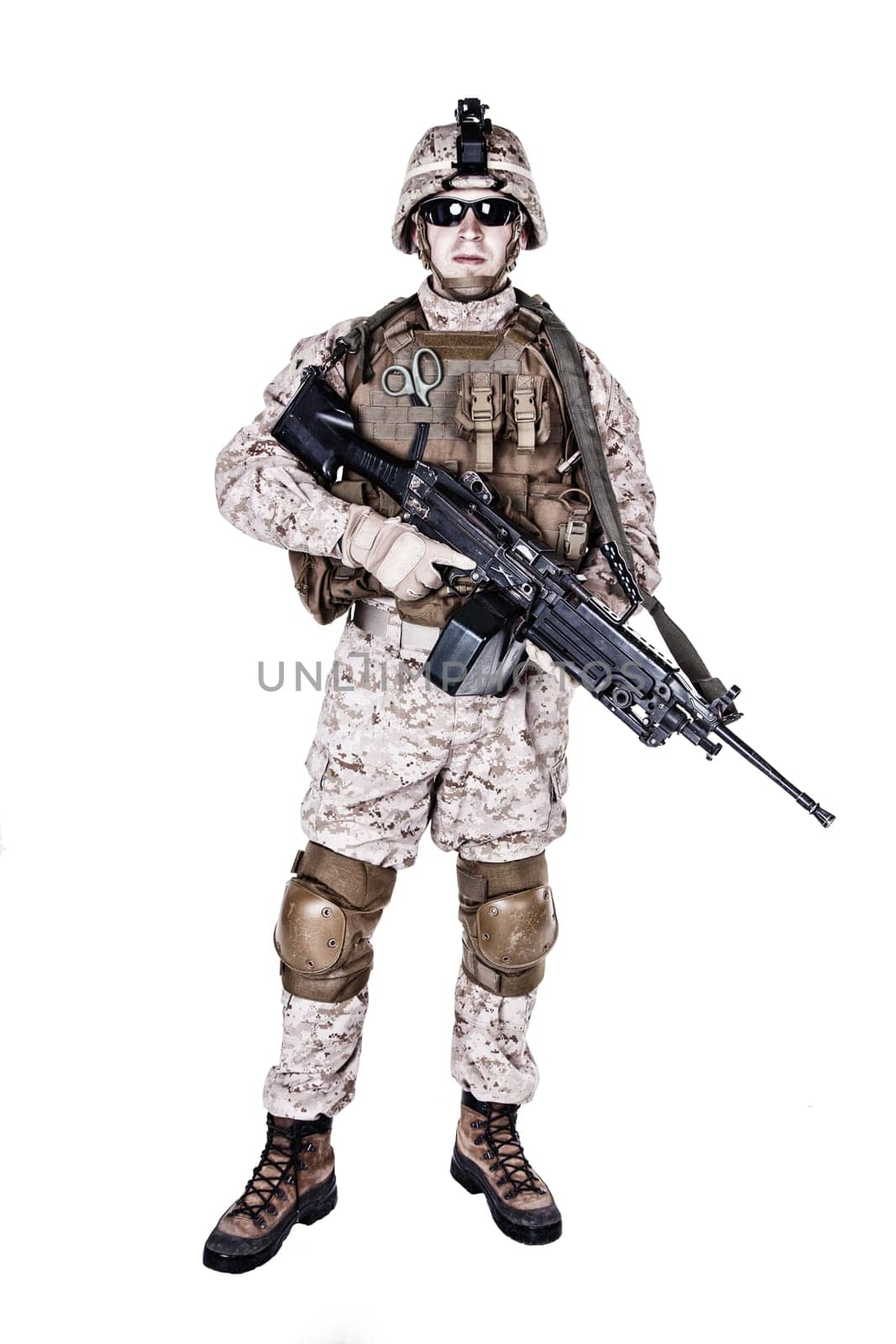US marine with his assault rifle on white background