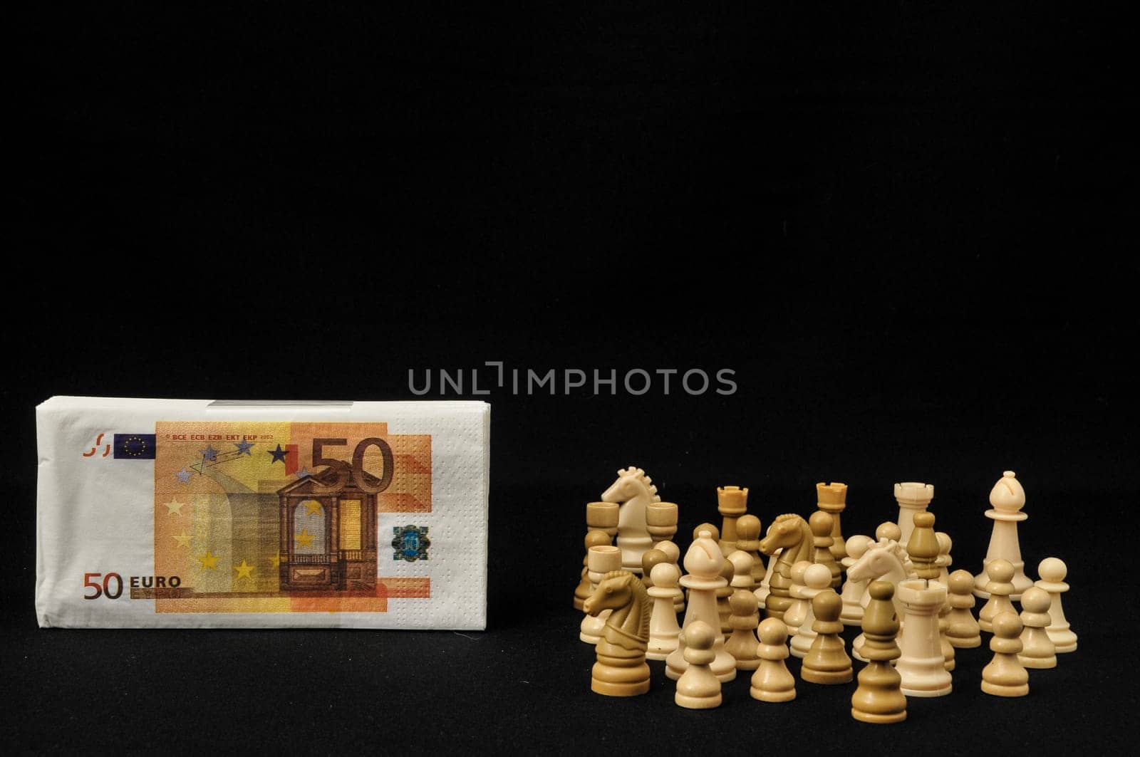 Money Strategy Concept White Chess and Currency on a Black Background