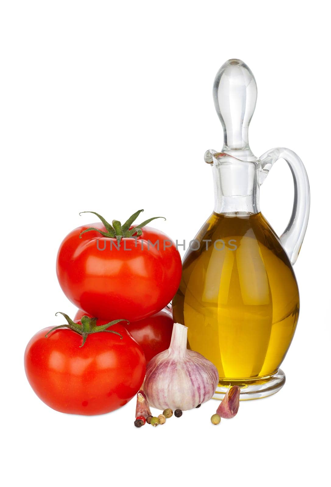 Carafe with olive oil,tomatoes and garlic