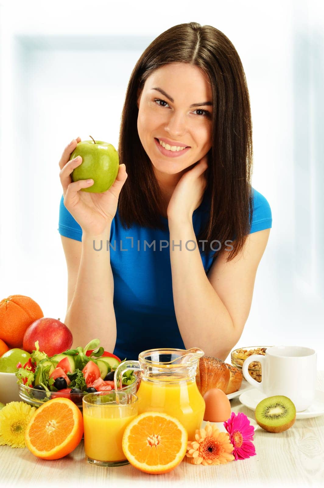 Young woman having breakfast. Balanced diet.