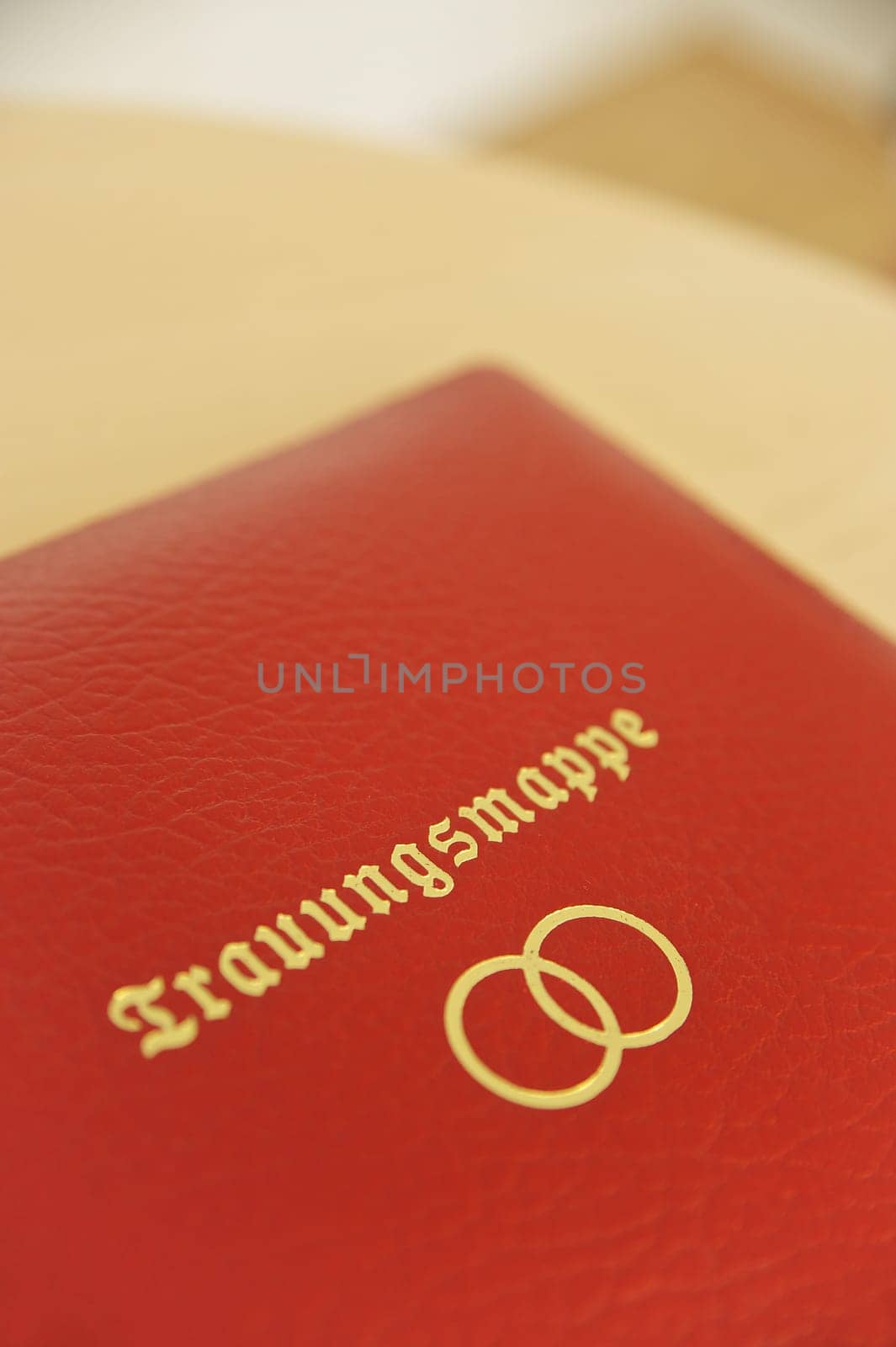 Red german wedding book with golden letters