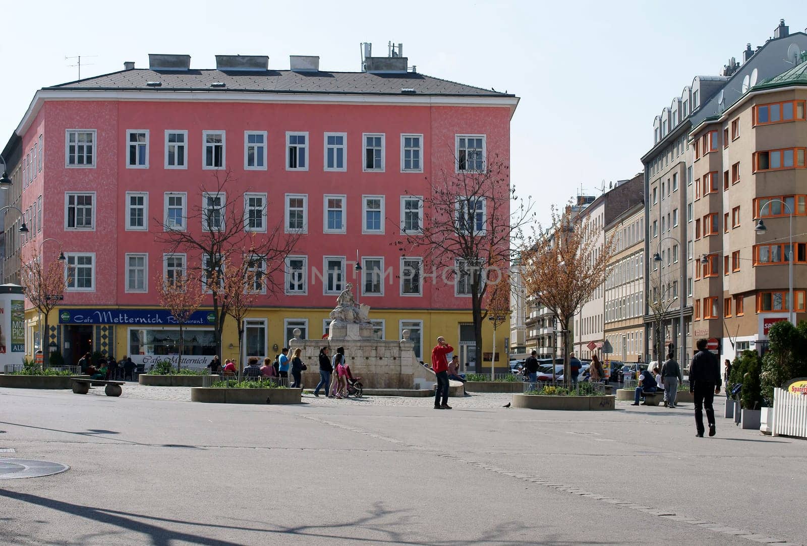 Vienna,Austria - March 30,2014: Passers-by,tourists and families on the Siebenbrunnenplatz in fine weather on March 30,2014 in Vienna.