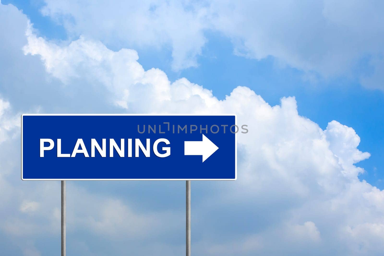 financial planning on blue road sign with blue sky