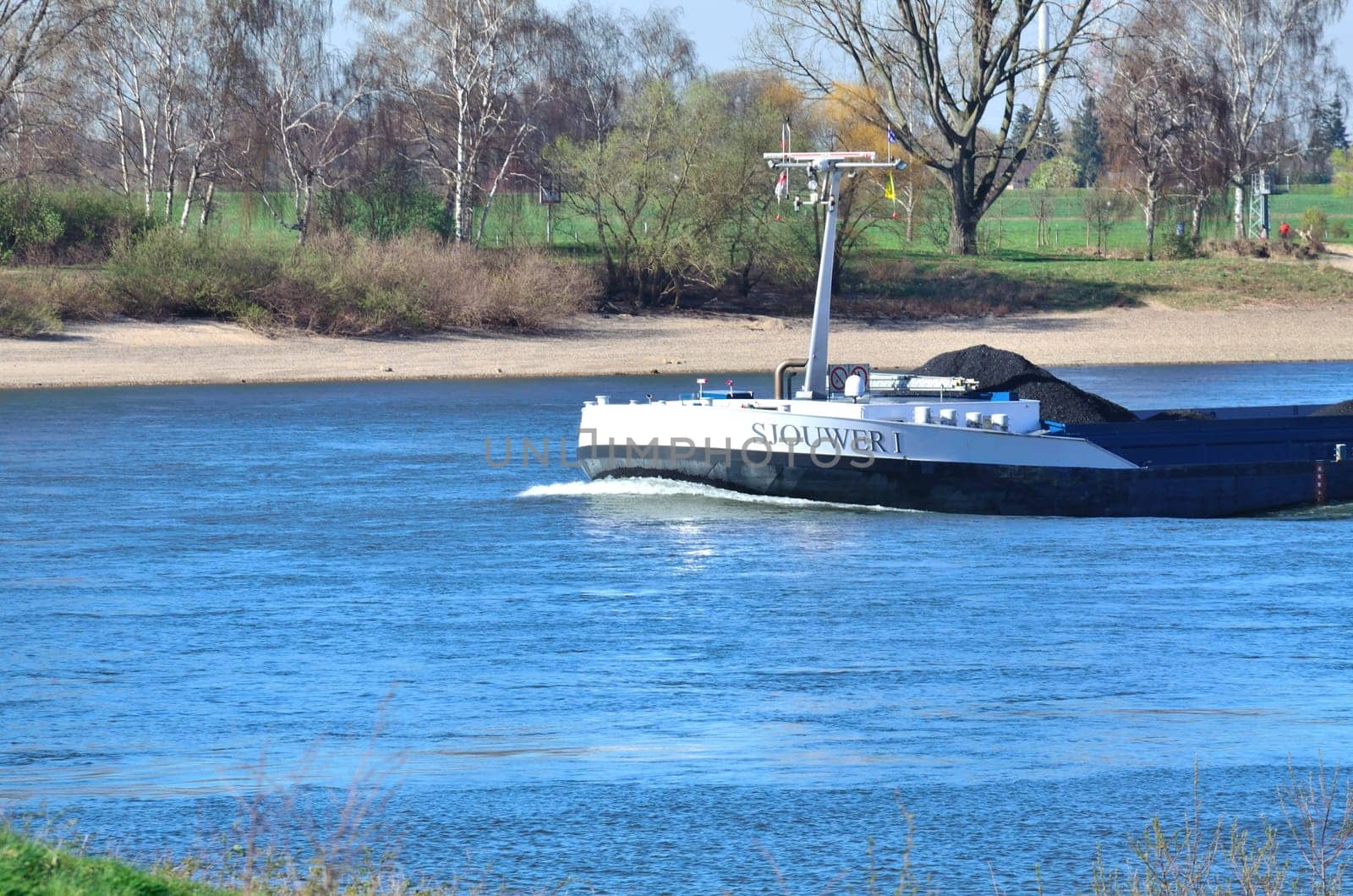 A barge on the Rhine,it is designed for sailing on inland waters and inland waterways.