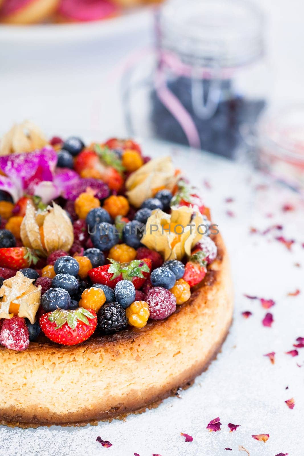 Closeup of delicious sponge cake topped with fresh berries