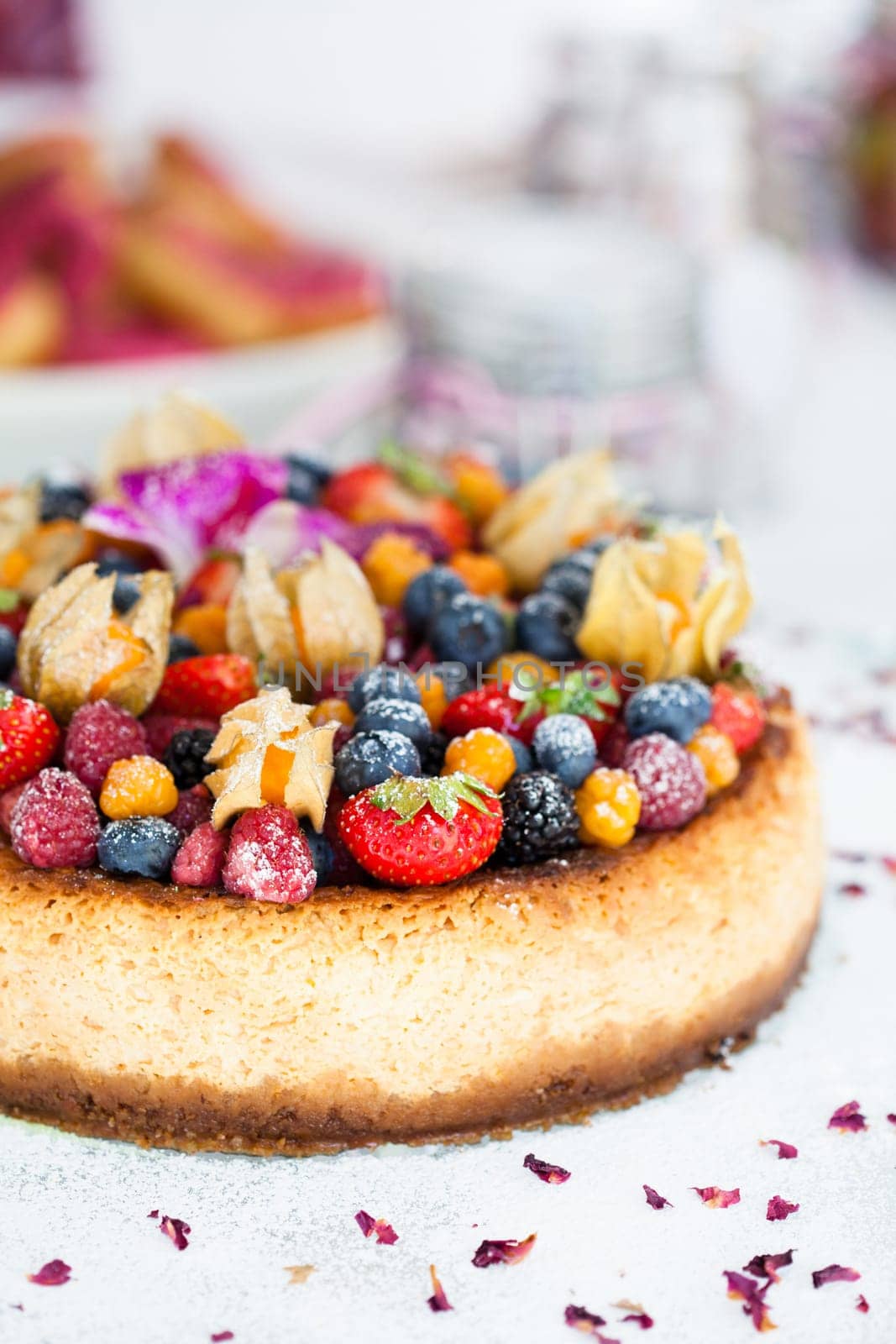 Closeup of delicious sponge cake topped with fresh berries