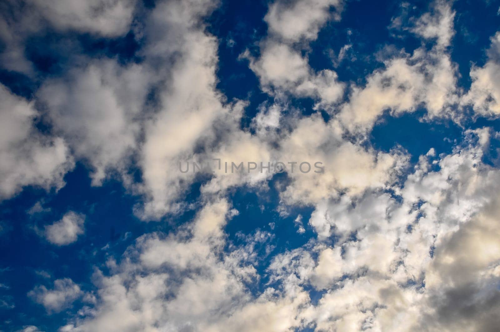 Cloudscape, Colored Clouds at Sunset near the Ocean