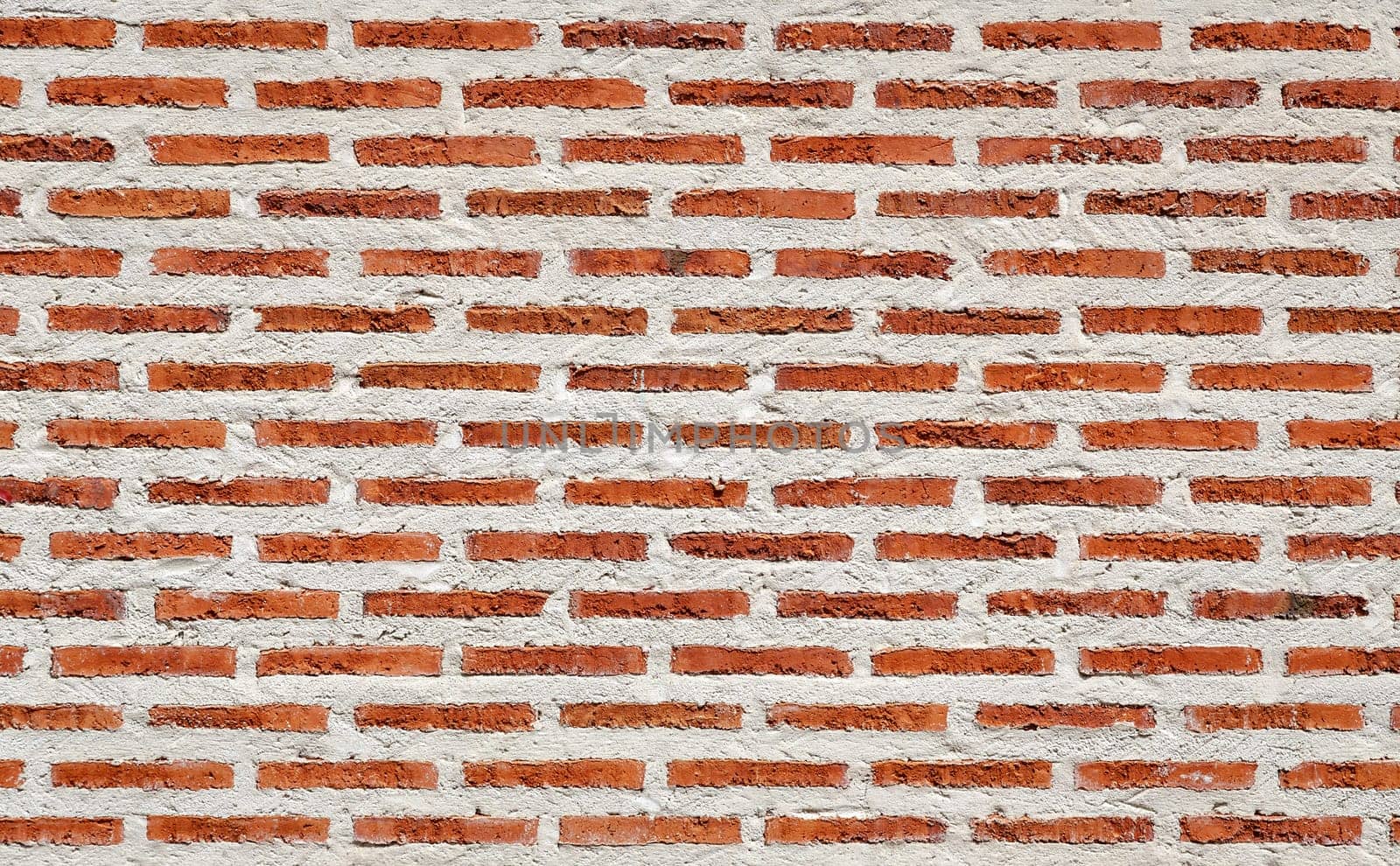 Red aged brick wall texture background