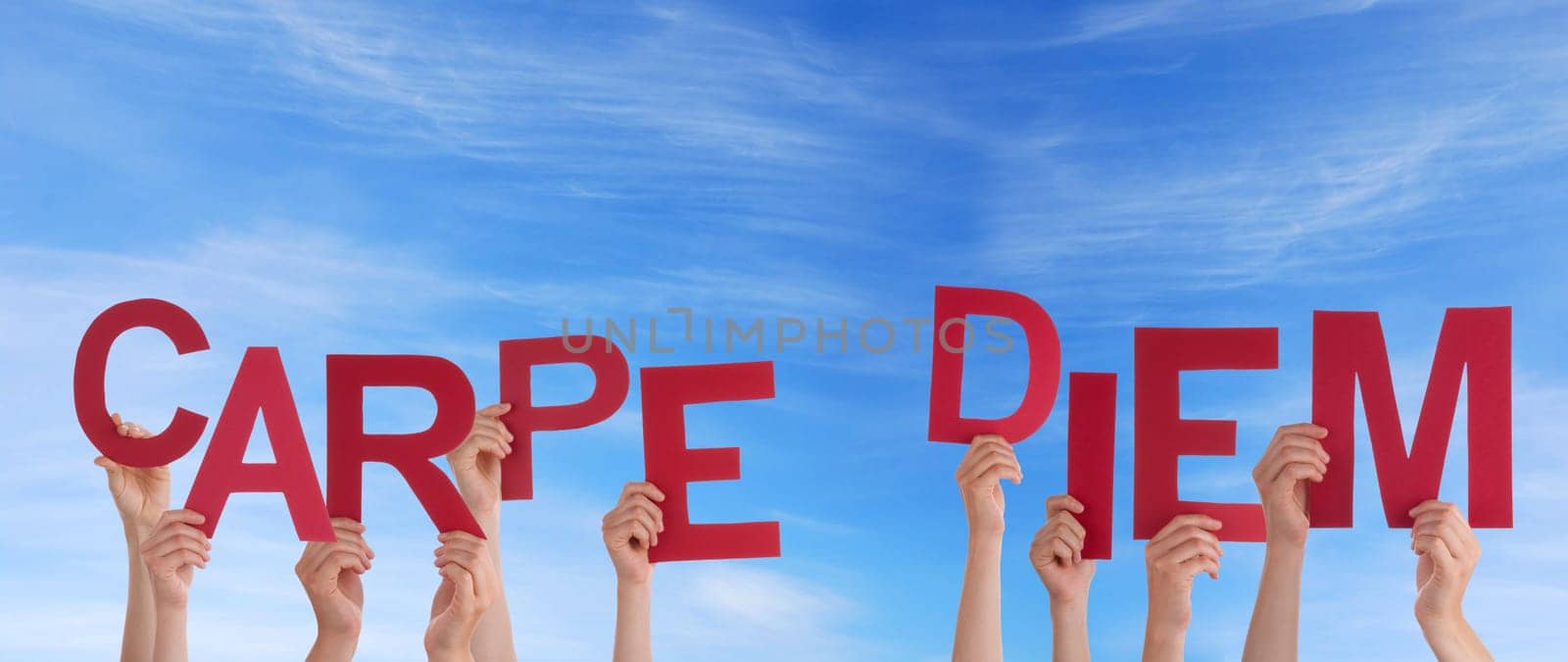 hands holding four pieces of a puzzle with copy space, gray background