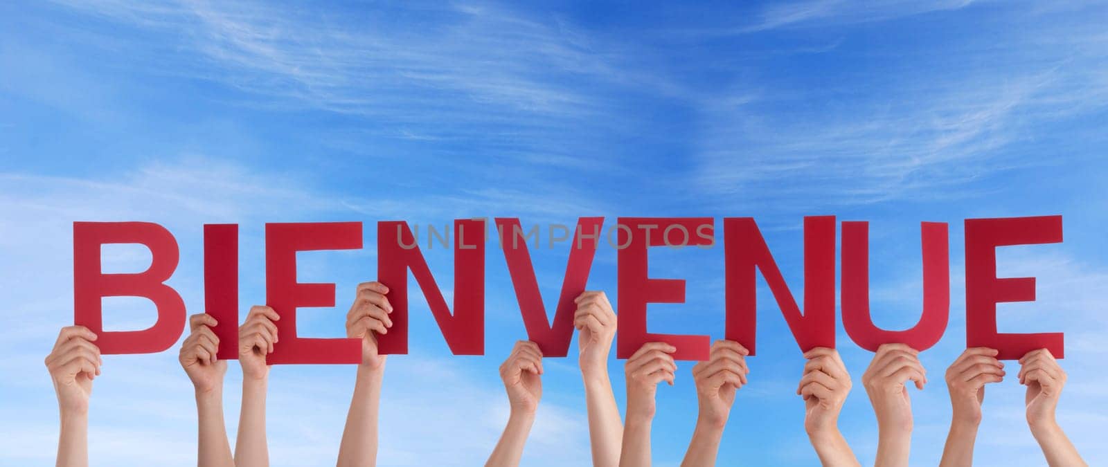 hands holding four pieces of a puzzle with copy space, gray background