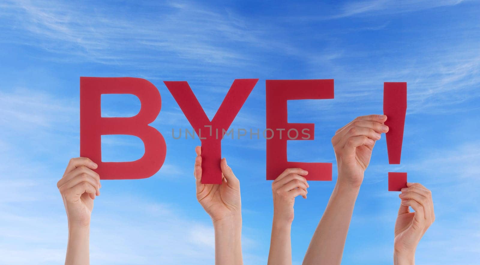 hands holding four pieces of a puzzle with copy space, gray background
