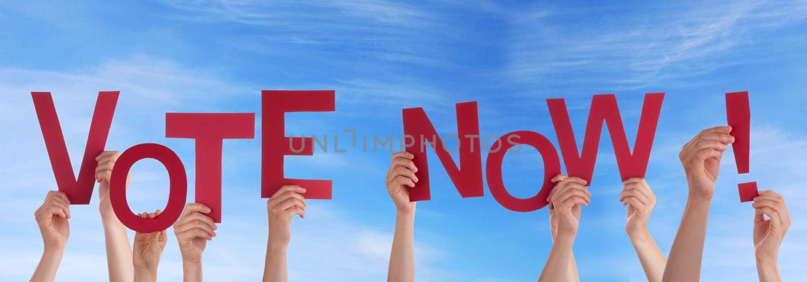 hands holding four pieces of a puzzle with copy space, gray background