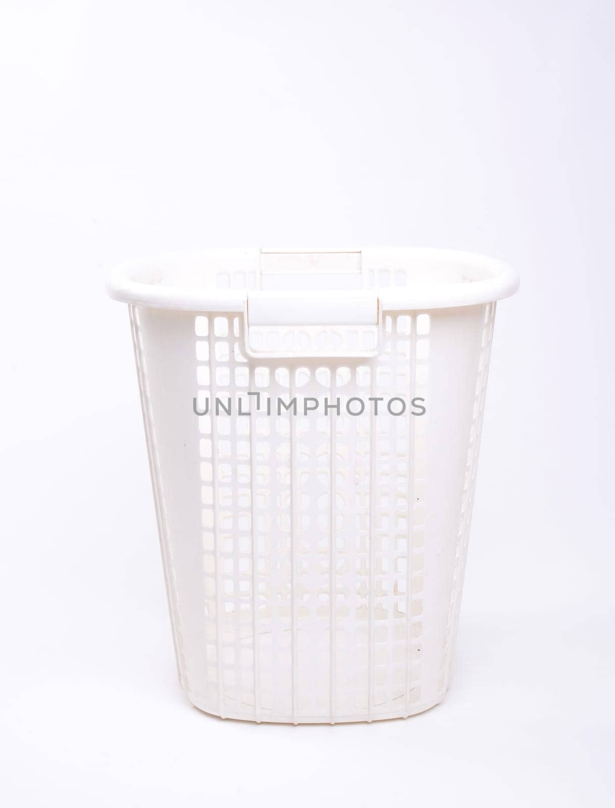 white plastic basket isolated on white background