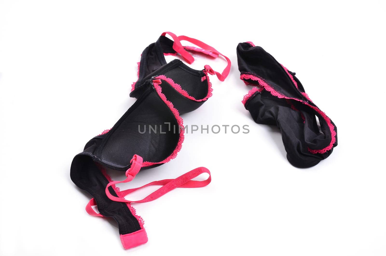 unwashed sexy female underwear on white background