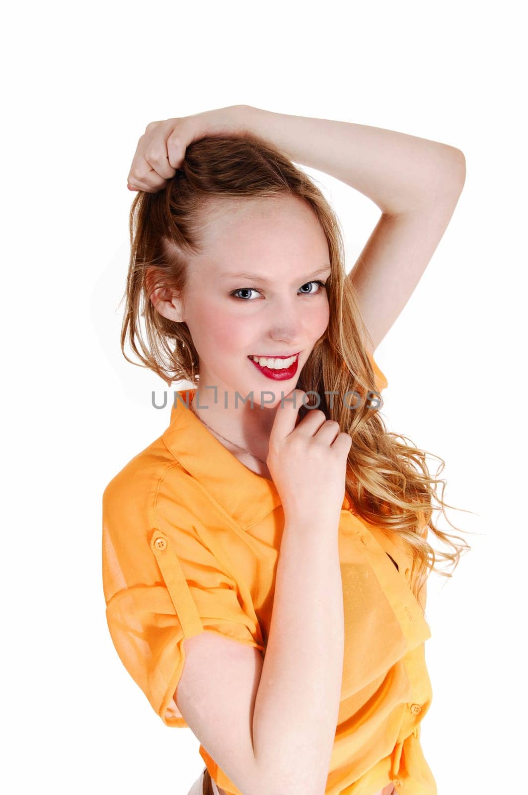 A portrait picture of a beautiful young teenager girl with long blond hair.and blue eyes, smiling, isolated for white background..