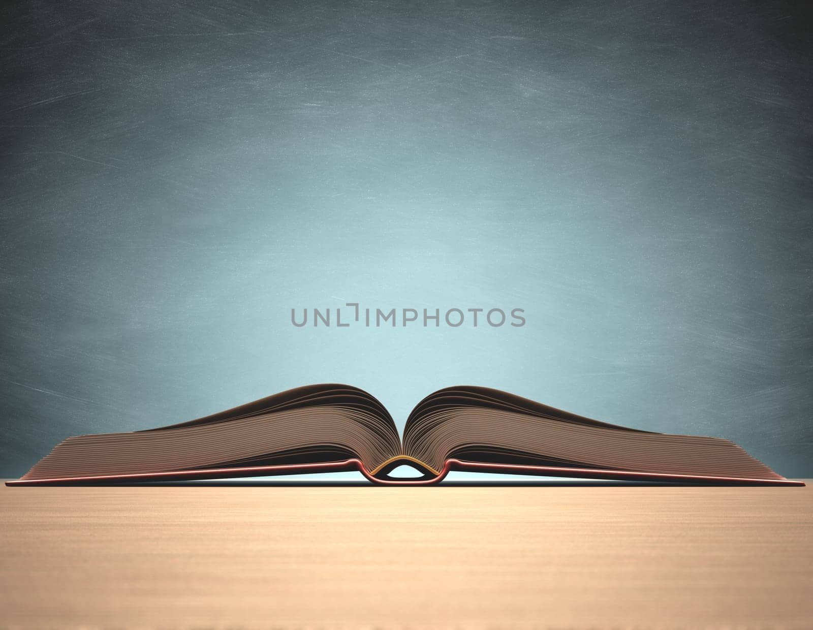 Open book over the table with blackboard on background. Clipping path included.
