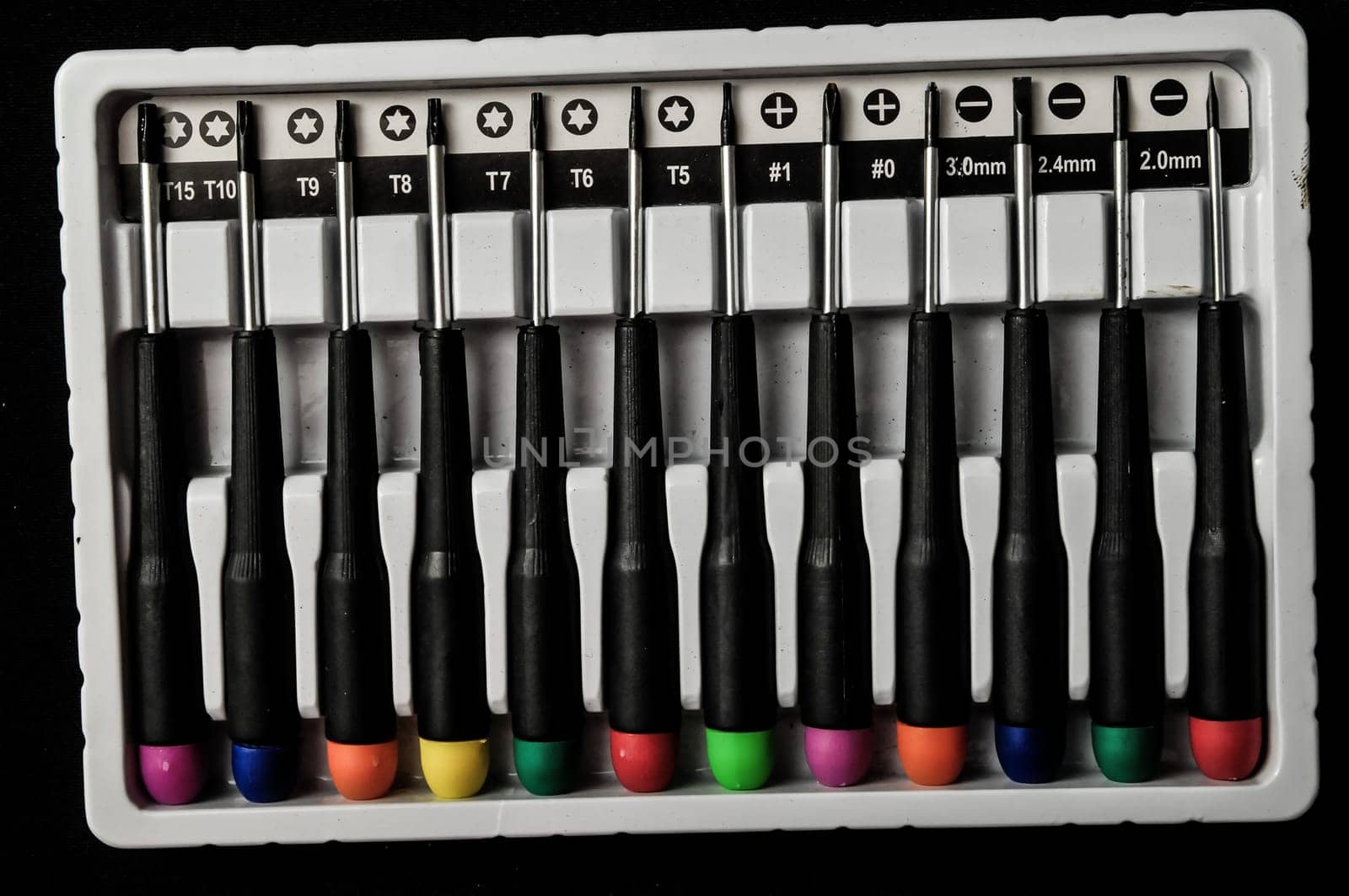 A set of screwdriver on a black background