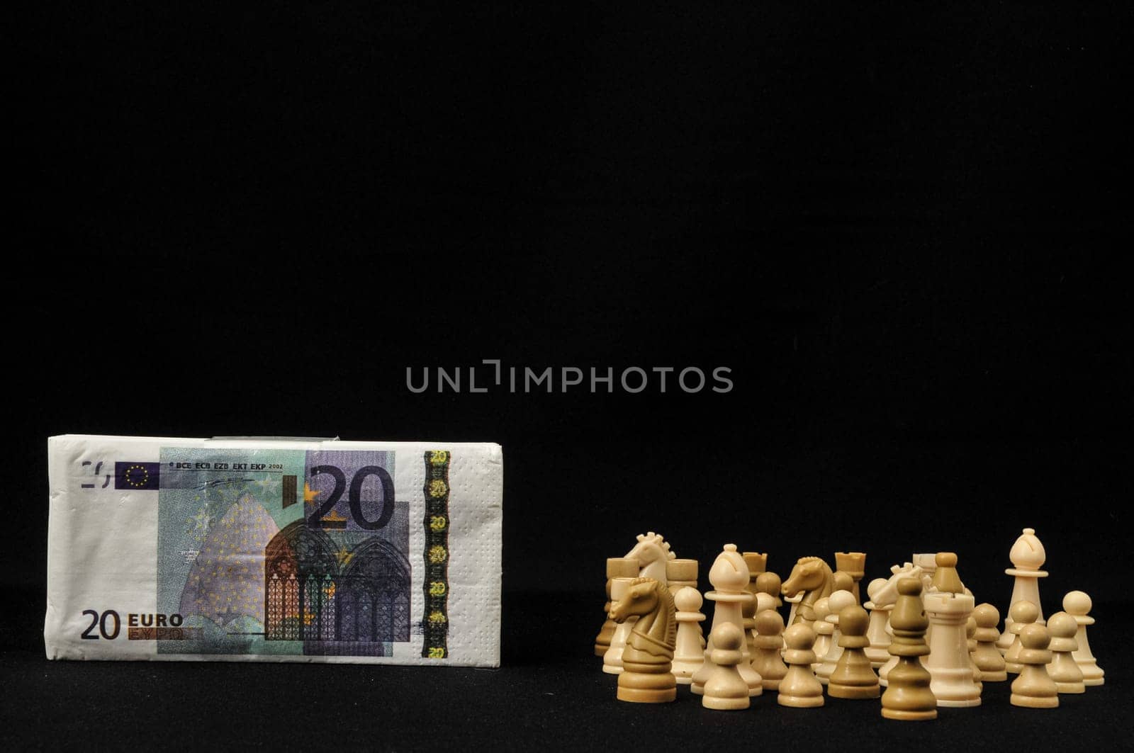 Money Strategy Concept White Chess and Currency on a Black Background