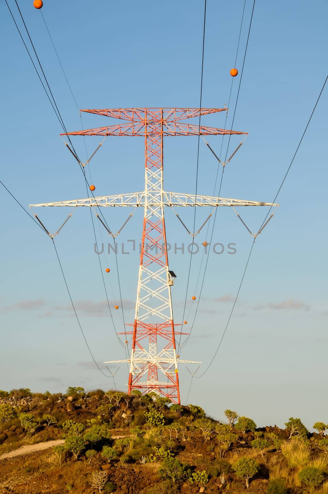Energy Electricity Power Pylon on a Blue Sky