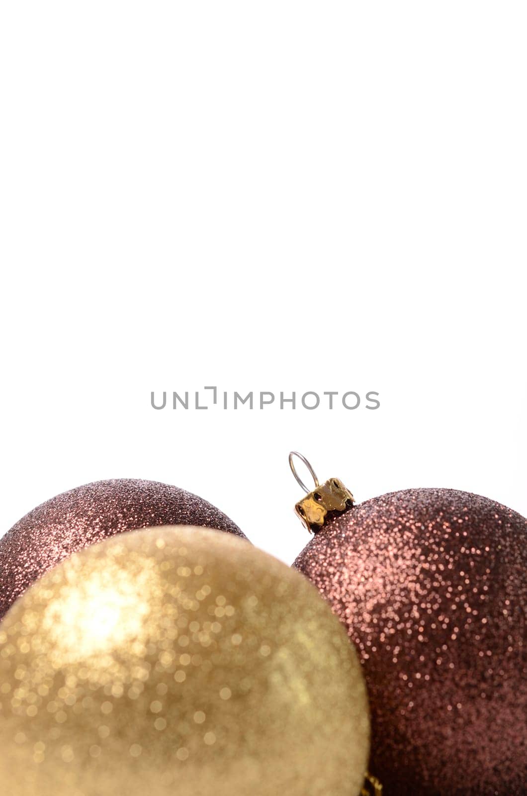 Christmas baubles on a white background with space for text