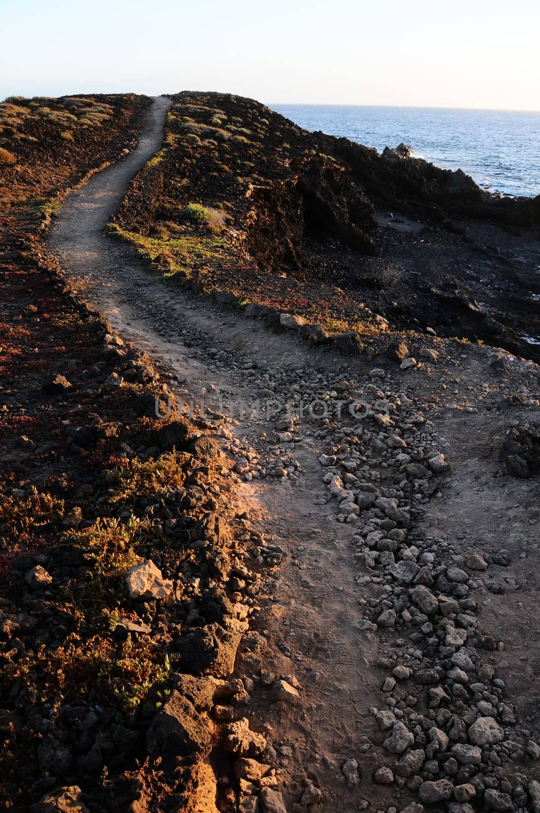 Travel Concept Background - Pathway in the Volcanic Desert Tenerife Canaty Islands Spain