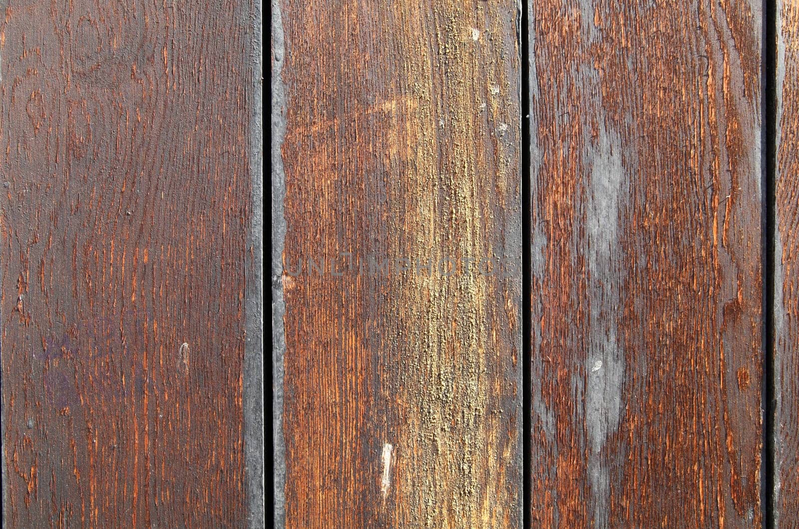 Vertical wooden strips background with light brown
