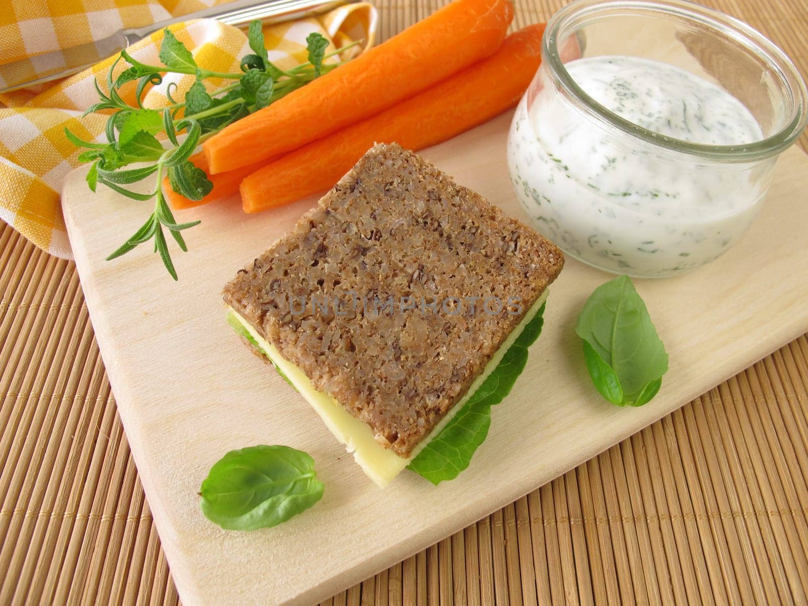 Whole meal bread and carrots with herb yoghurt