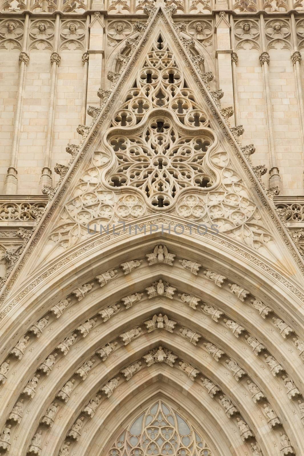Entrance portal of Gothic Barcelona Cathedral (Barcelona, Catalunya, Spain). Vertically.
