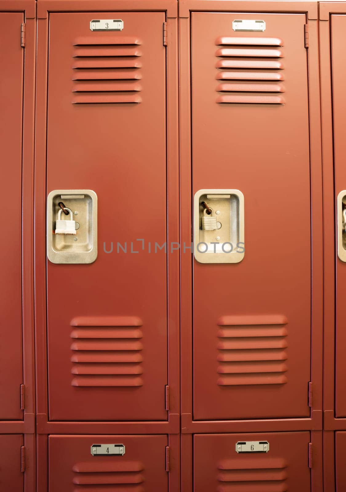 A row of locked starage lockers vertical composition