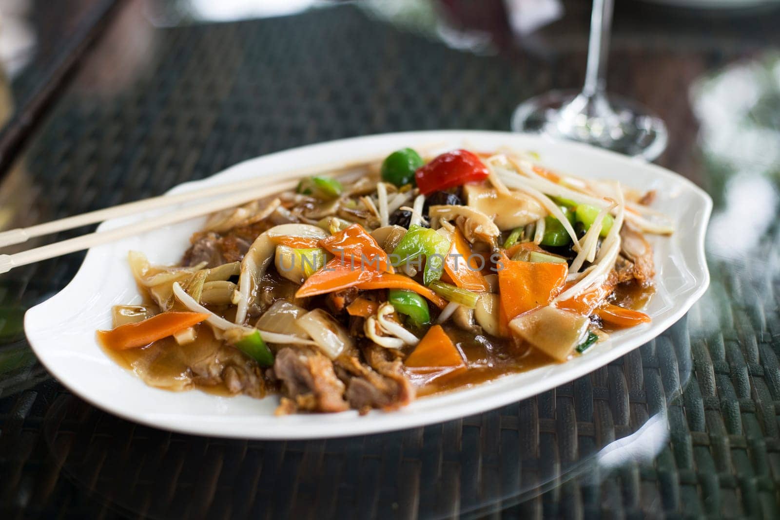 Traditional duck chop suey in restaurant close up