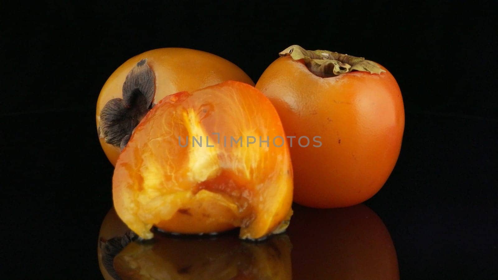 Red ripe persimmons by homydesign
