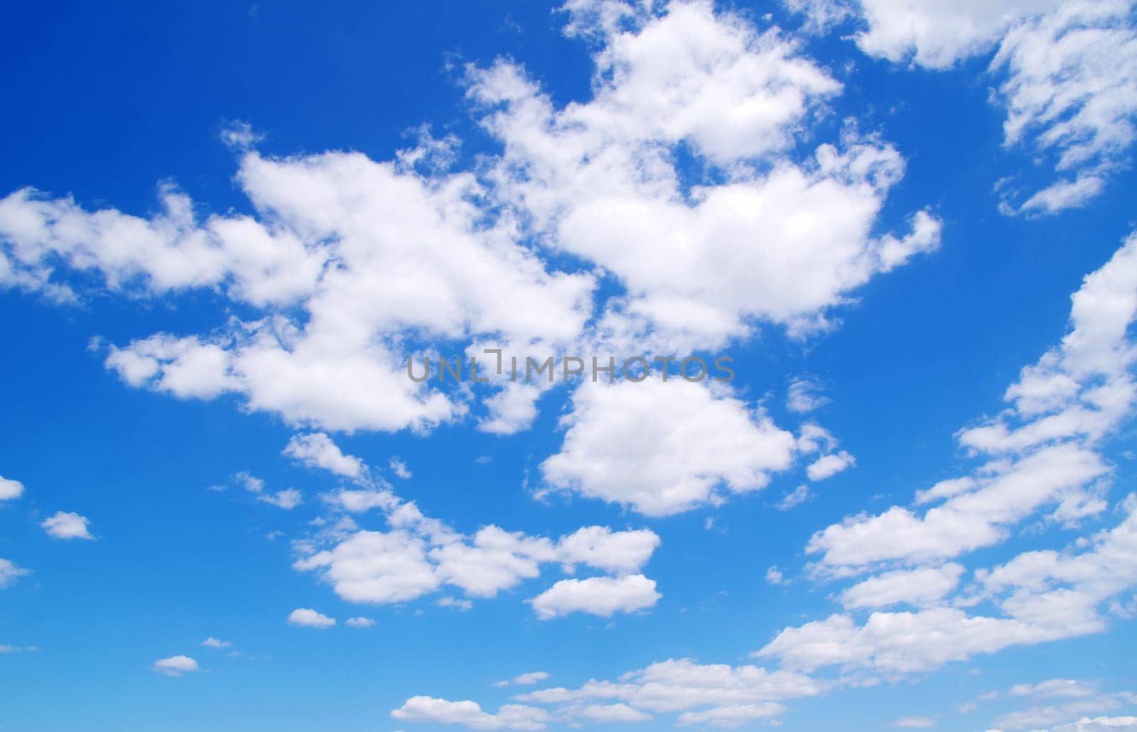 blue sky with clouds and sun