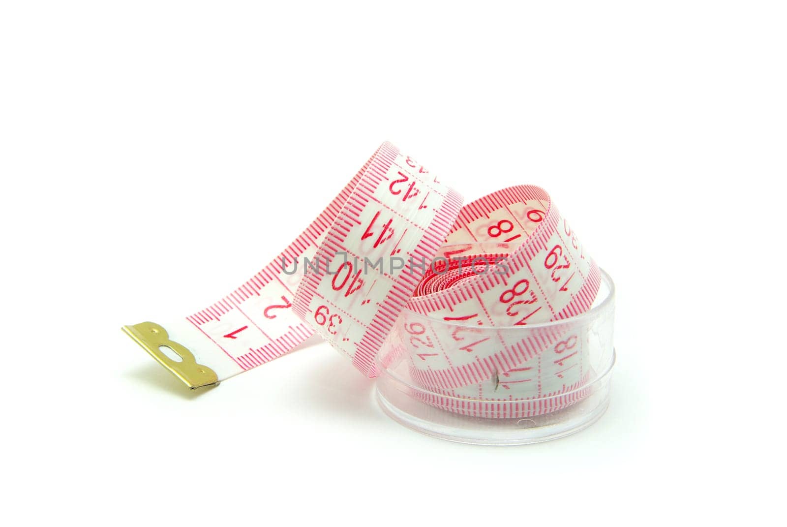 Measuring tape of the tailor on white