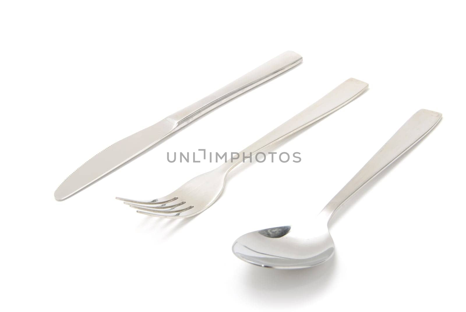 Fork, spoon and knife isolated on white background