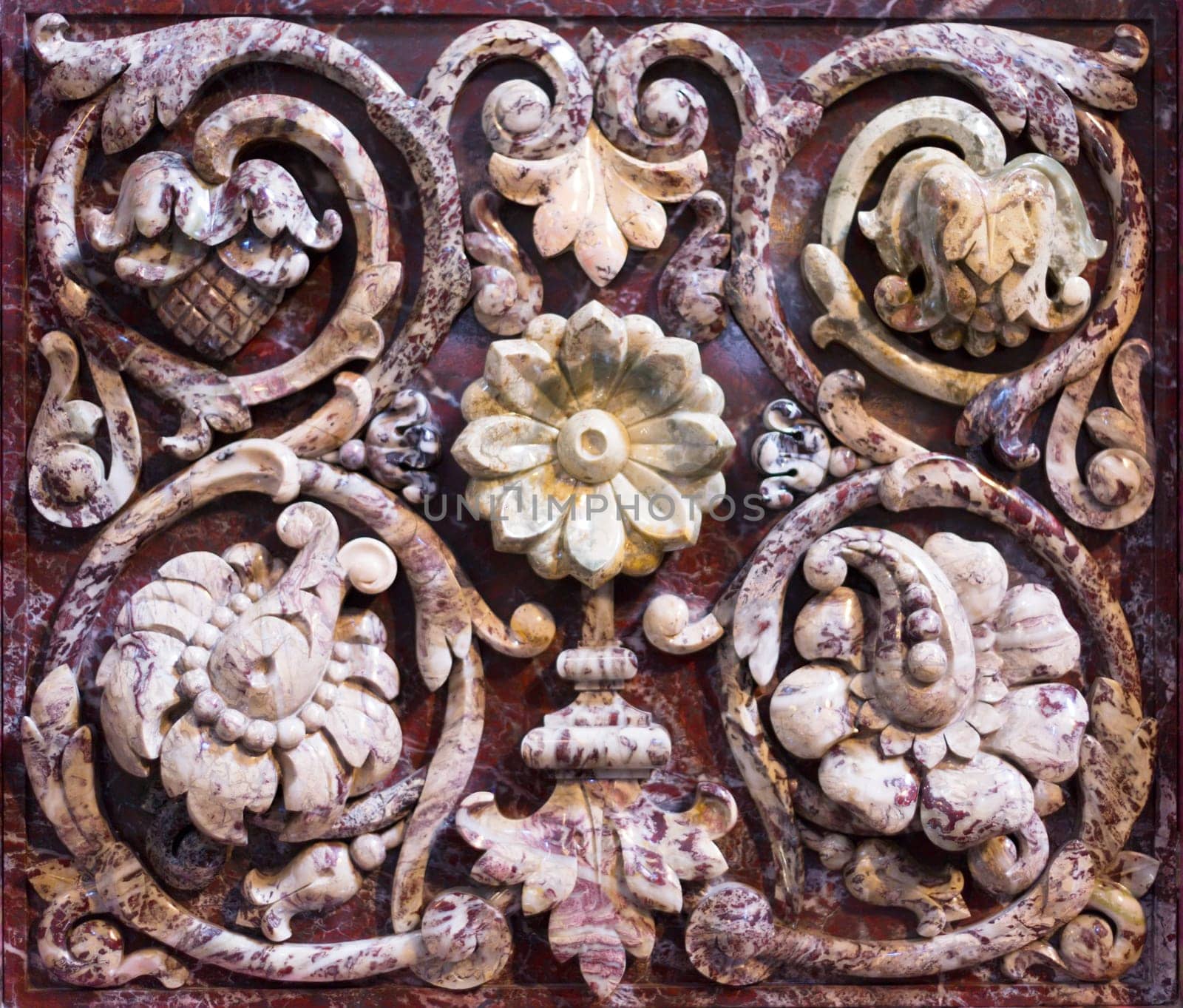 Marble bas-relief with floral motif, background