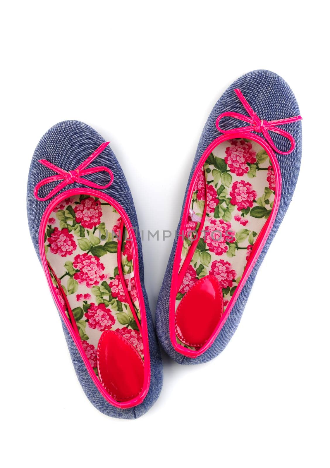 Lightweight women's shoes with floral pattern. Isolate on white.