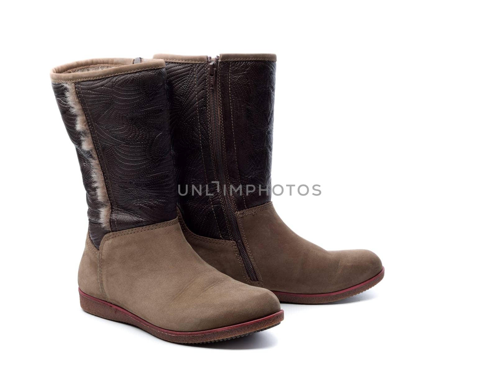 Pair of leather women's boots with fur. Isolate on white.