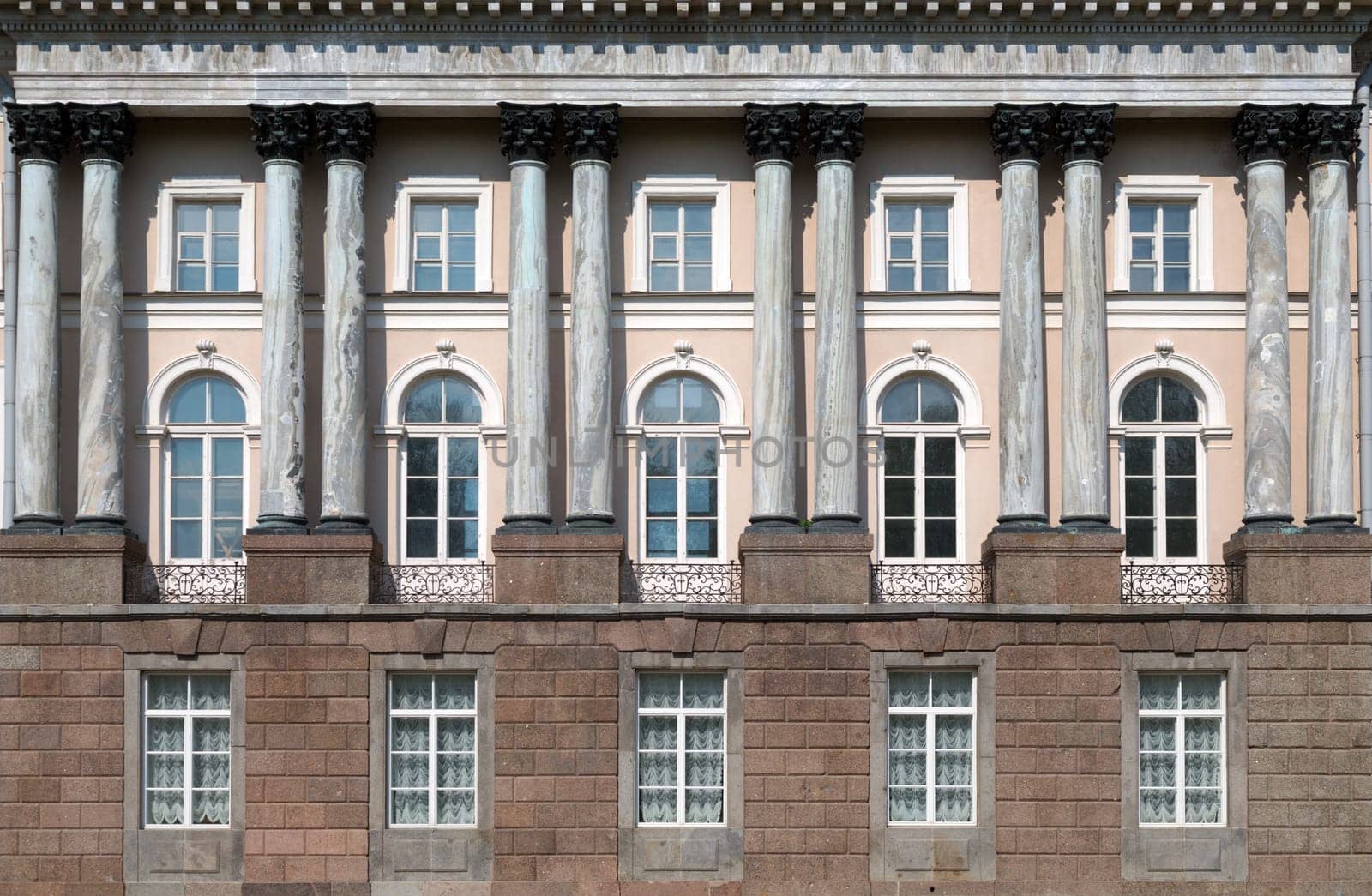 facade of an old building with columns