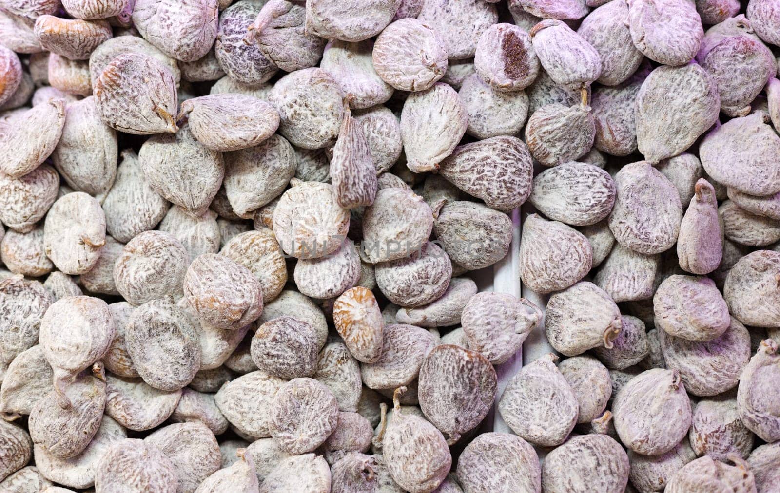 Dried figs in flour as background