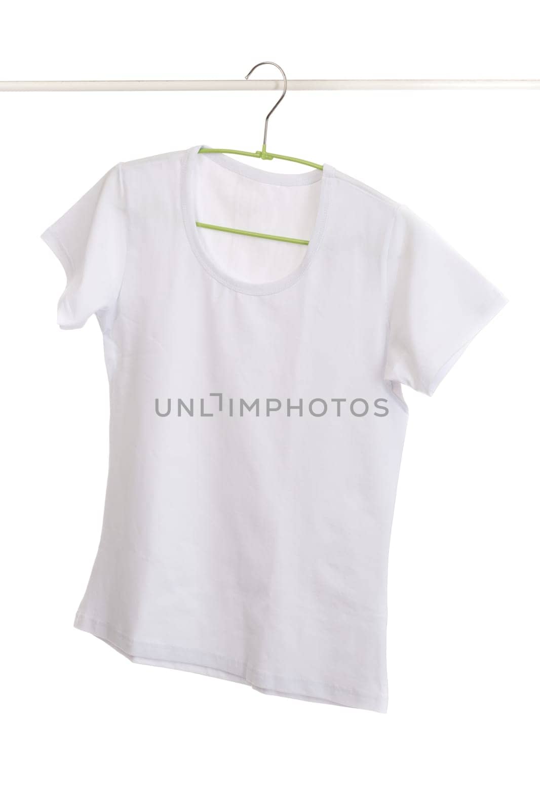 t-shirt with clothes hanger isolated on white