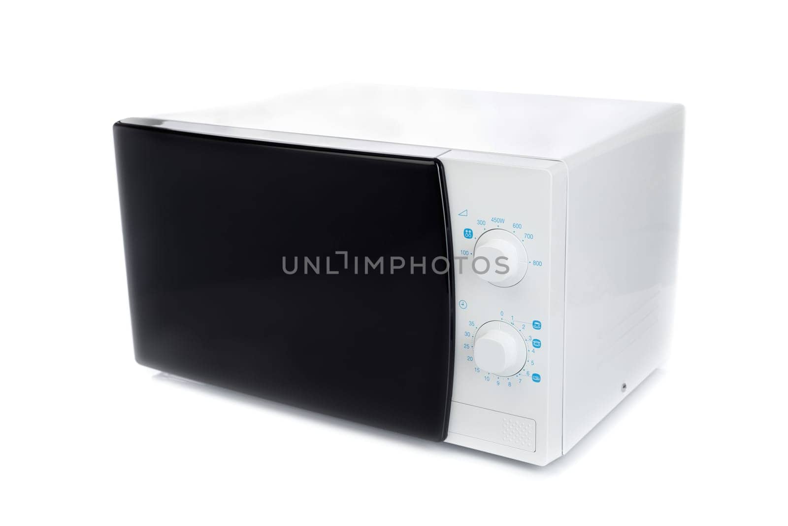 New microwave oven with analog control. Isolate on white