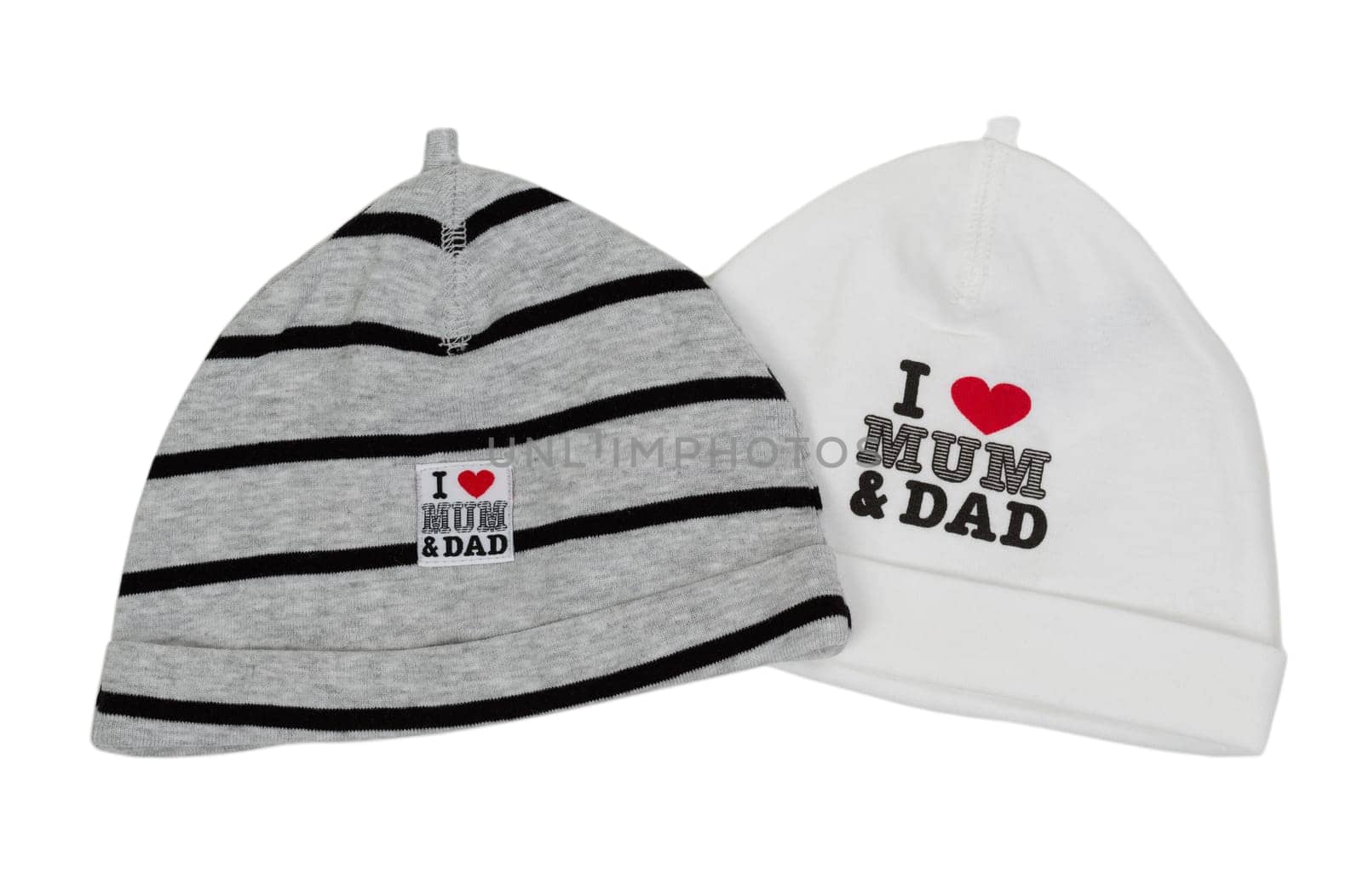 Two children's hats with the inscription "I love my mom and dad"""