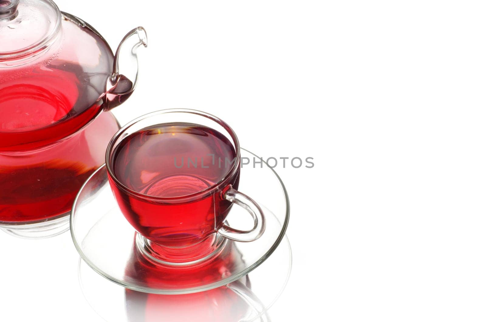 Tea being poured into glass tea cup
